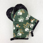 Load image into Gallery viewer, oven mitts with skulls, ravens and flowers
