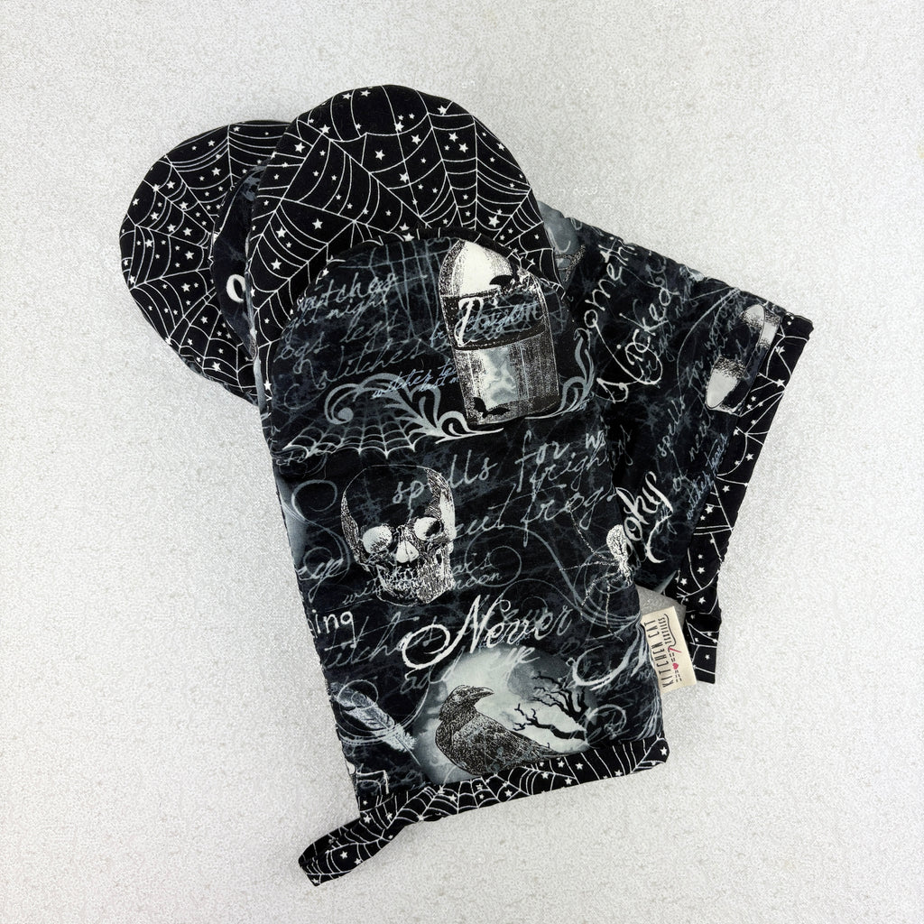 oven mitts with skulls and spooky things