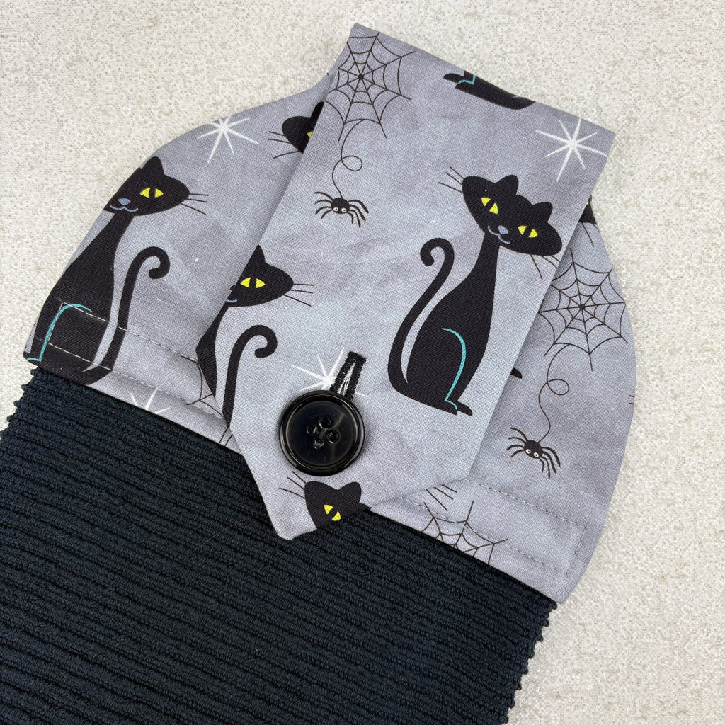 kitchen towel with black cats and spider webs