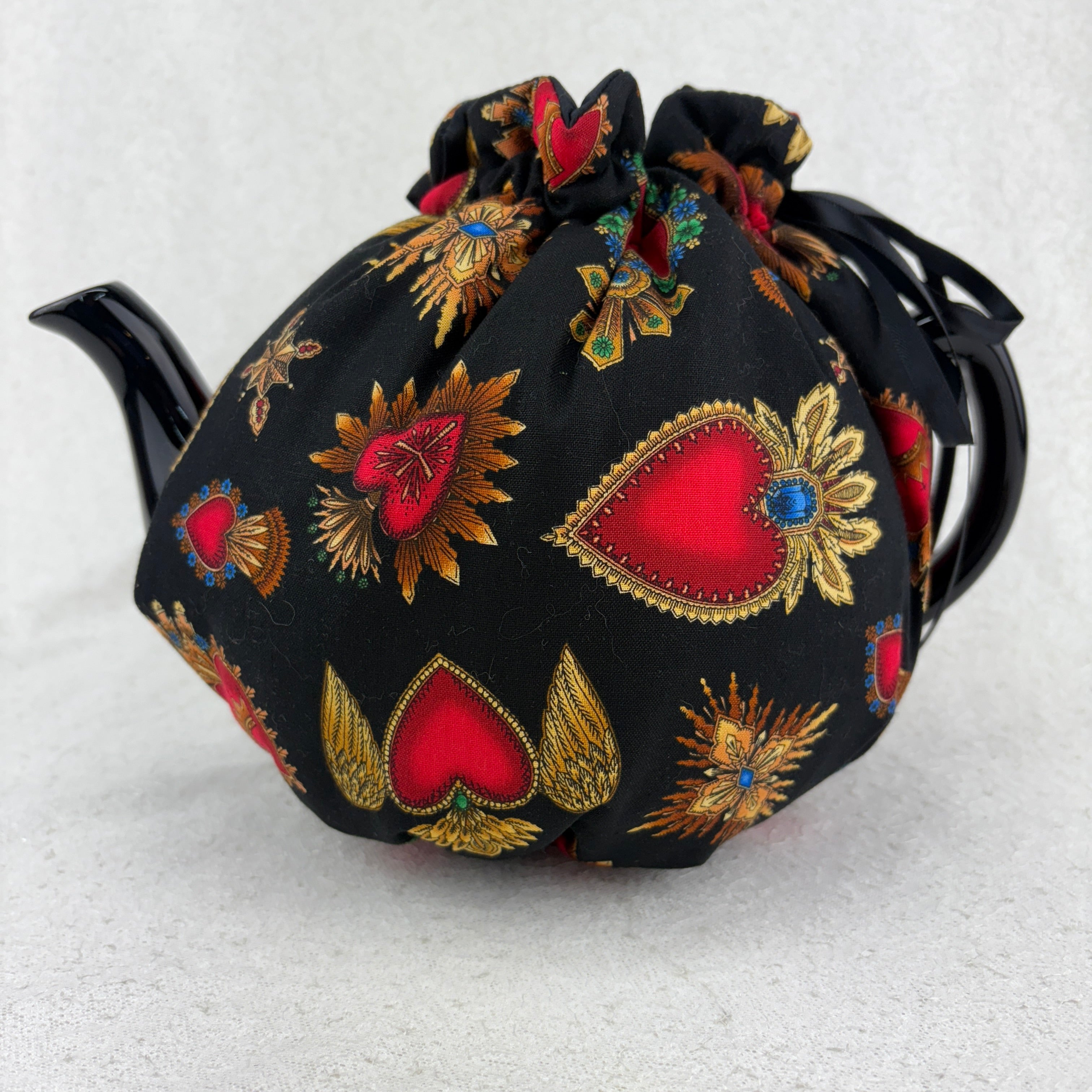 tea cosy sacred heart