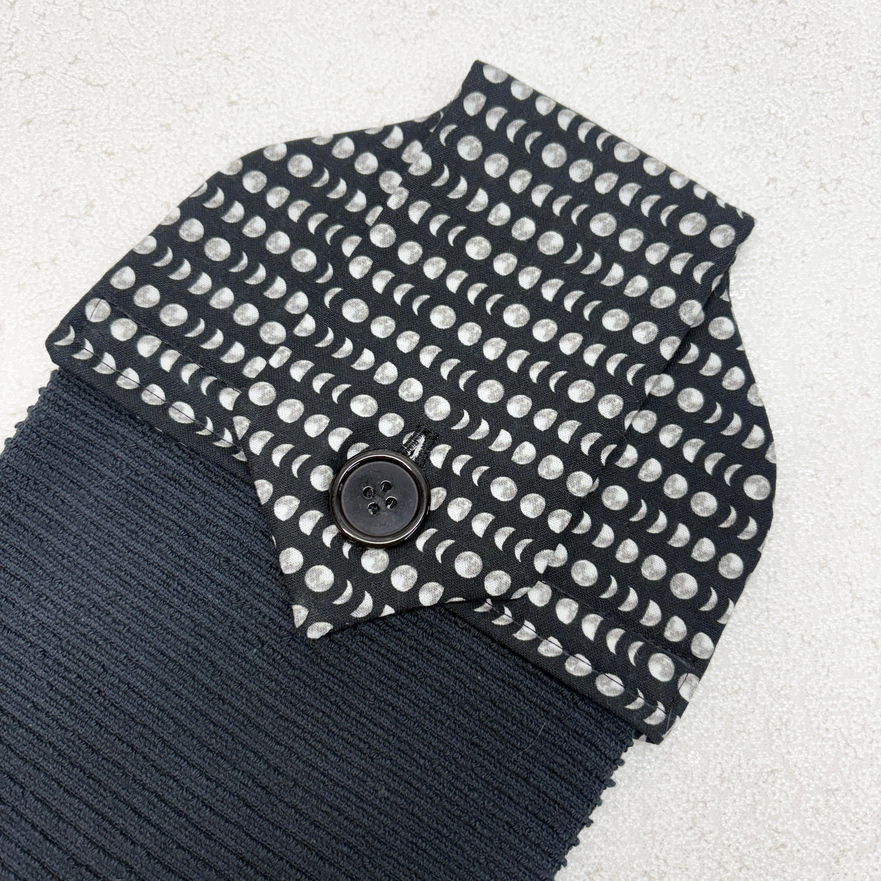 Kitchen towel with moon phases patterned fabric