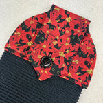 Load image into Gallery viewer, kitchen towel with design of black cats hiding in Christmas flowers
