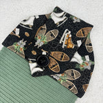Load image into Gallery viewer, kitchen towel with vintage skating and snowshoe pattern
