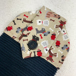 Load image into Gallery viewer, cotton topped towel with fun all over dog pattern
