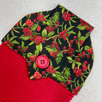 Load image into Gallery viewer, cotton topped towel with pattern of holly with gold accents
